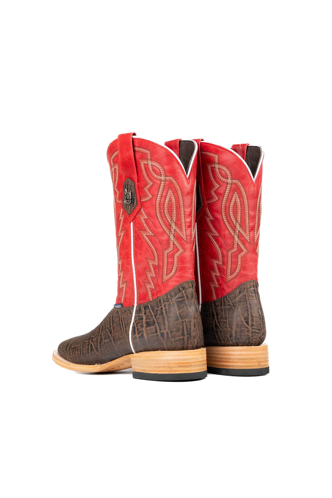 Back view of the Renegate Elephant cowboy boots crafted from genuine leather, featuring a square toe, brown elephant print vamp, red shaft with embroidered shaft, and rubber heel.