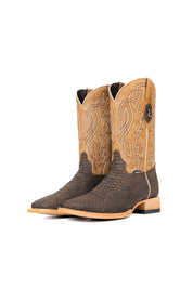 The Renegate Python boot in matte brown features brown Pirarucu fish print vamp, tan leather shaft with embroidery, a square toe, and leather sole. 