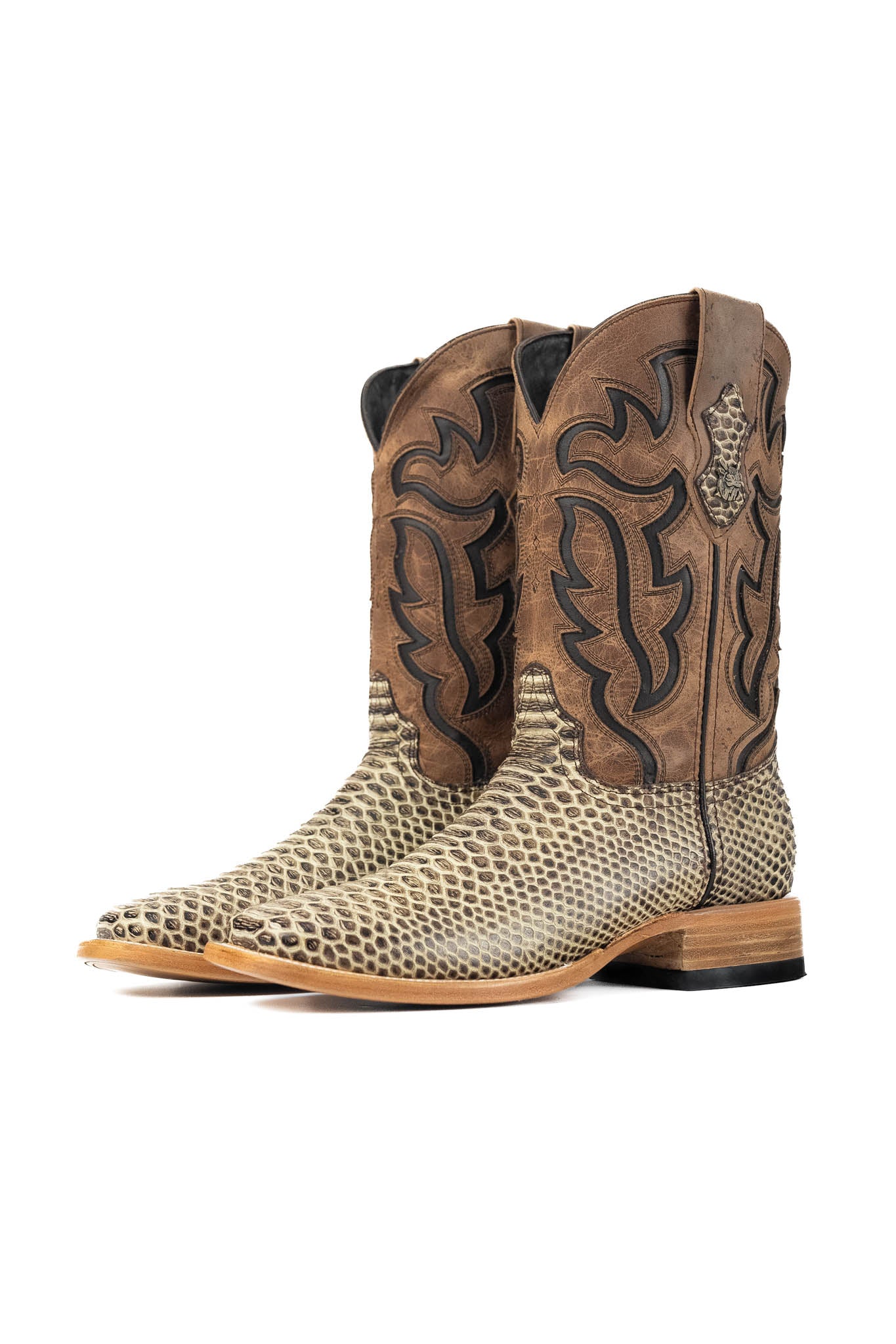 The Bruce boots have a rustic bone Python print vamp, a rugged brown leather shaft with bold inlays, a square toe, pull straps, and a sturdy Western sole.