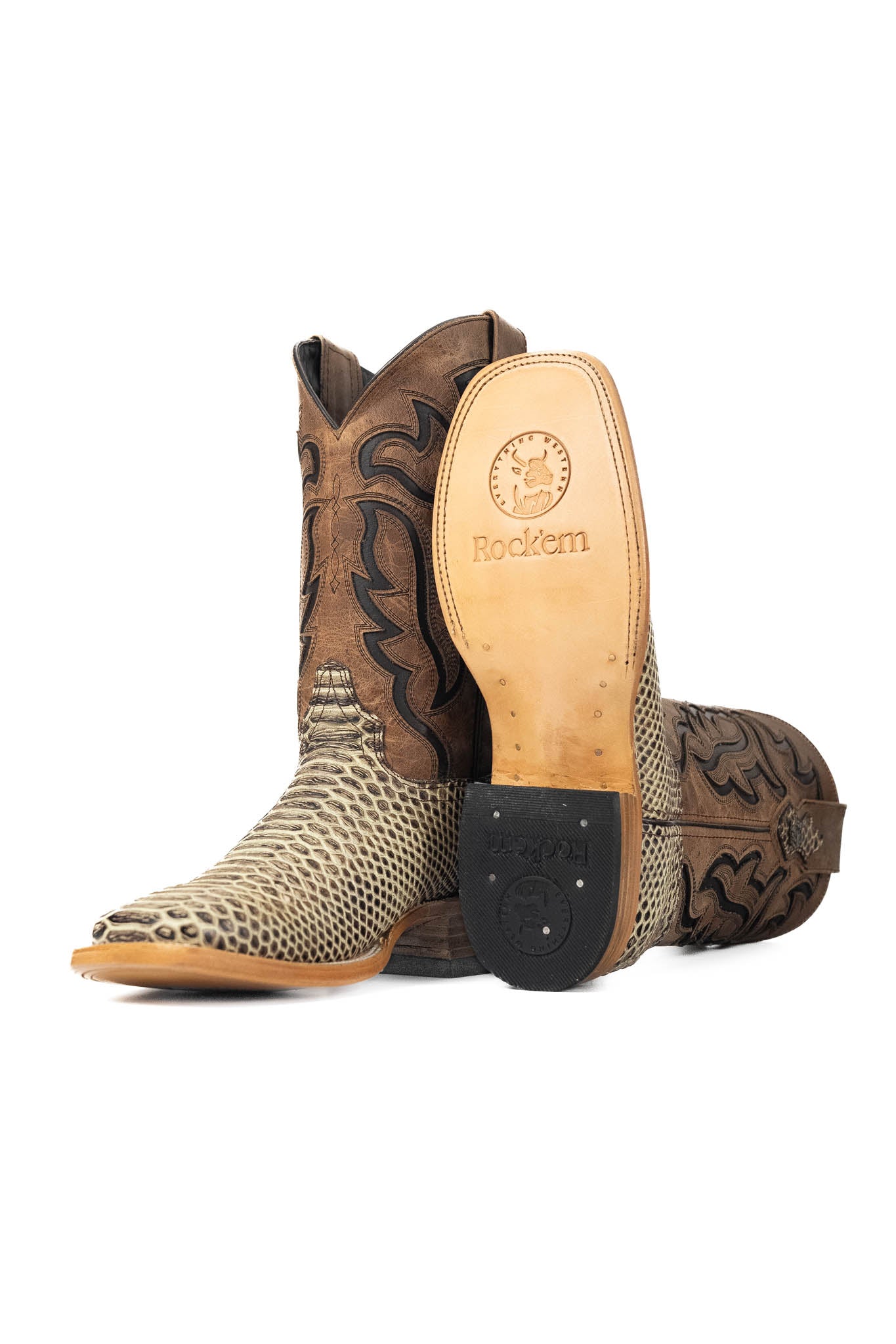 The Bruce boots have a rustic bone Python print vamp, a rugged brown leather shaft with bold inlays, a square toe, pull straps, and a sturdy Western sole.