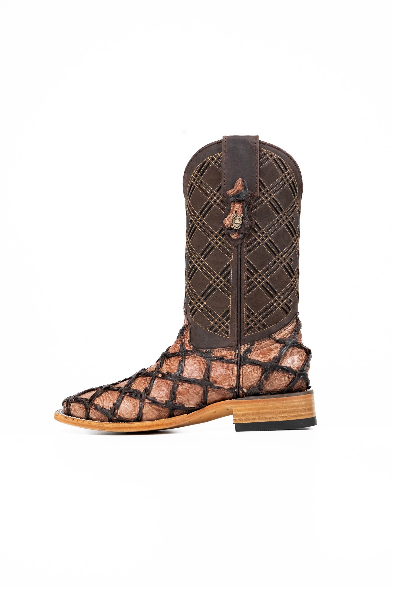 The Bradley boot features an oryx Pirarucu fish print vamp, a brown leather shaft with a laser-cut pattern, a square toe, and a natural-tone sole.