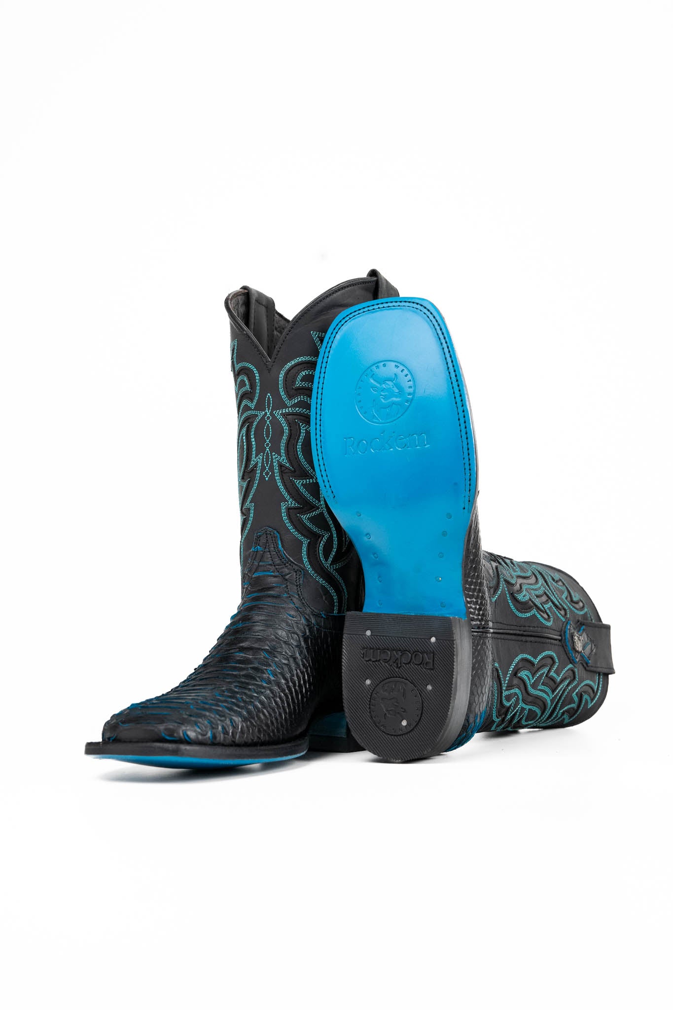 The Bruce cowboy boots are genuine leather, featuring a square toe, Python print vamp, turquoise embroidery shaft, rubber heel, and a turquoise sole. 