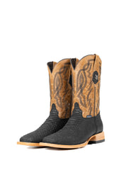 The Renegate Python boot in matte brown featuring a black pirarucu fish print vamp, tan leather shaft with embroidery, a square toe, and leather sole. 
