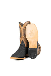 View of the Renegate Python boot in matte black featuring a black Pirarucu fish print vamp, tan leather shaft with embroidery, a square toe, and leather sole. 