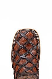 The Bradley boot features a cognac Pirarucu fish print vamp, a brown leather shaft with a laser-cut pattern, a square toe, and a natural-tone sole.