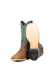 Side view of the Renegate Elephant cowboy boots crafted from genuine leather, featuring a square toe, brown elephant print vamp, teal shaft with embroidered shaft, leather sole and rubber heel.