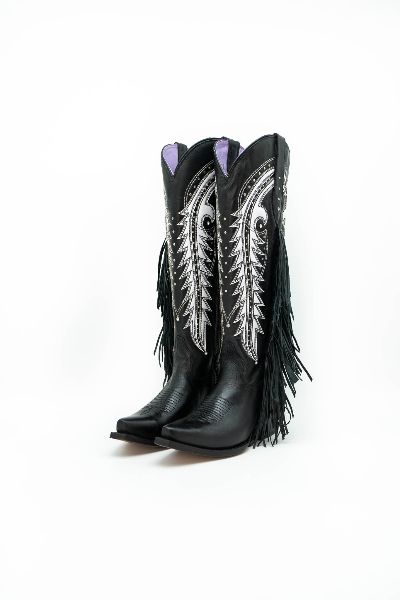 Knee high hotsell fringe boots