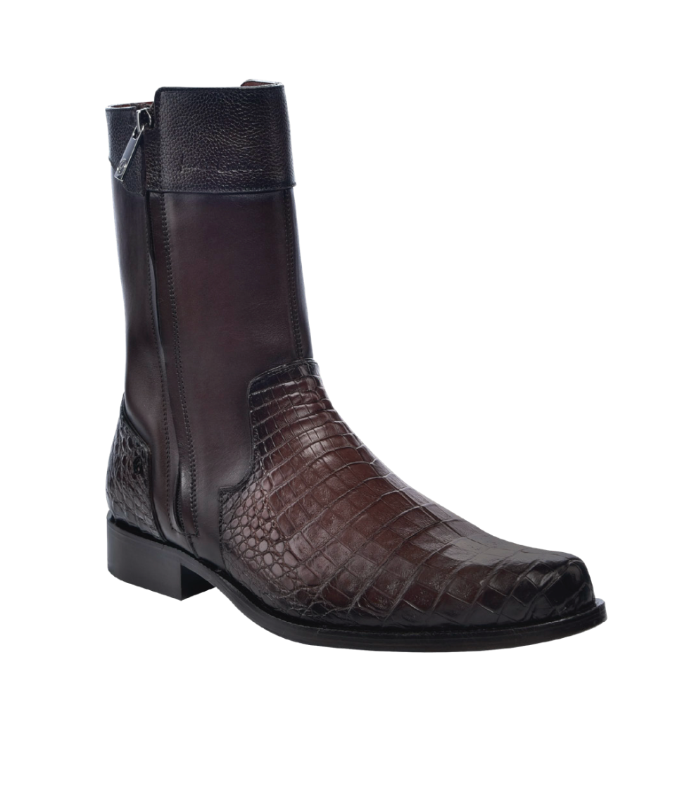 Brown leather boot with crocodile pattern on a white background