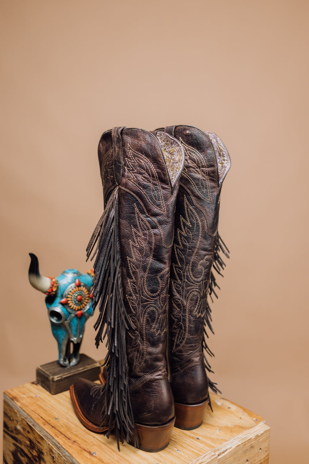 Black cowboy best sale boots with fringe