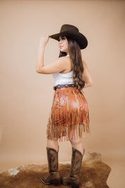 The Cathline Faux Leather Fringe Mini Skirt